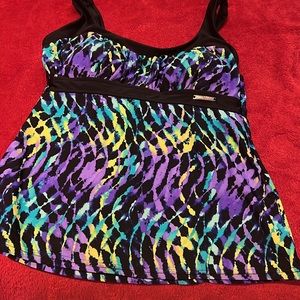 Tie dyed tankini swimsuit top very moderate coverage.Comfortable straps size S.
